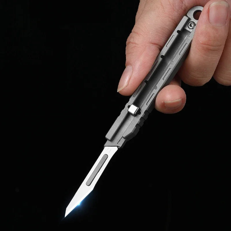 Mini Titanium Alloy Surgical Knife Outdoor Camping Open Box Portable Art Push Knife with 10pcs Blades