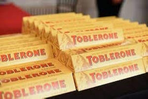 SWISS MILK CHOCOLATE WITH HONEY and ALMOND NOUGAT 18 X 100 gr Bars Three 6 Packs in Pakistan
